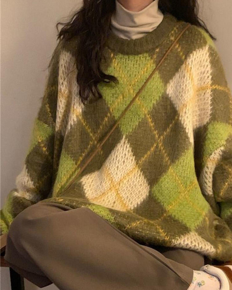 new student green argyle sweater
